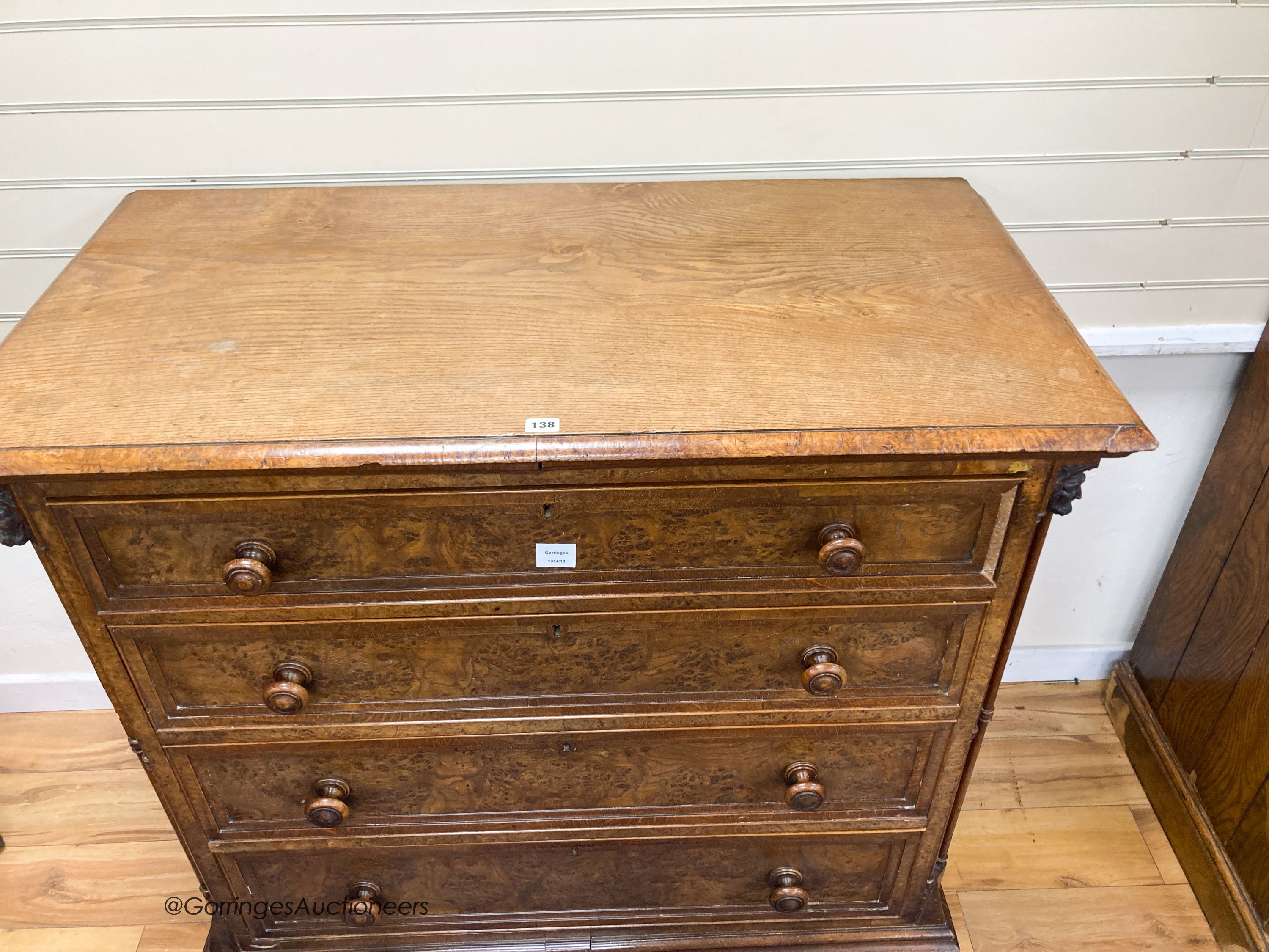 A mid 19th century oak and pollard oak chest fitted four long graduated drawers, width 114cm, depth 59cm, height 113cm